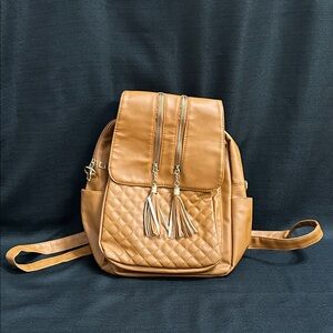 Elegant Tan Quilted Backpack with Tassels